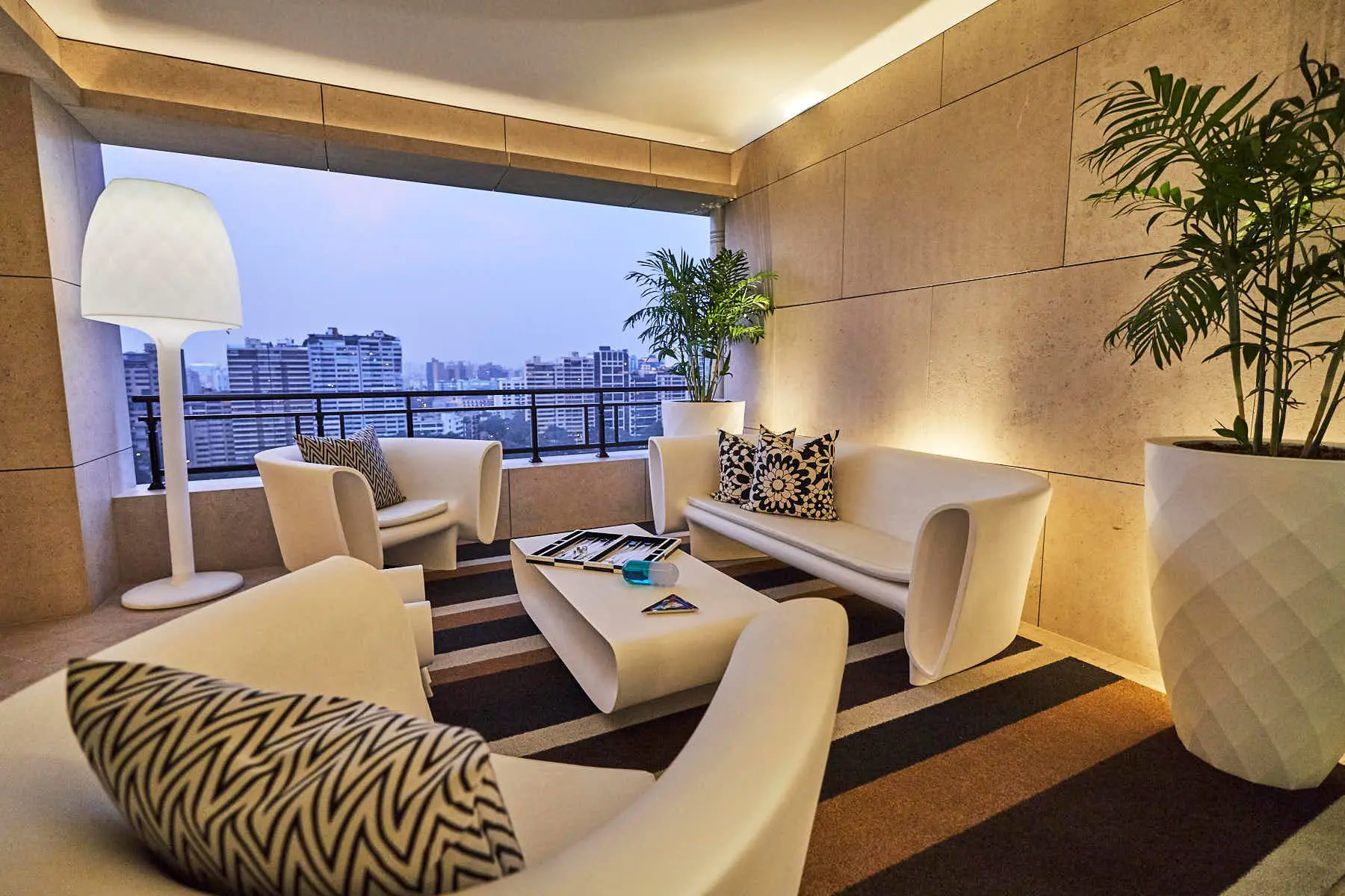 Interior design with Vondom's furniture sofa Bum Bum and lamp Vases