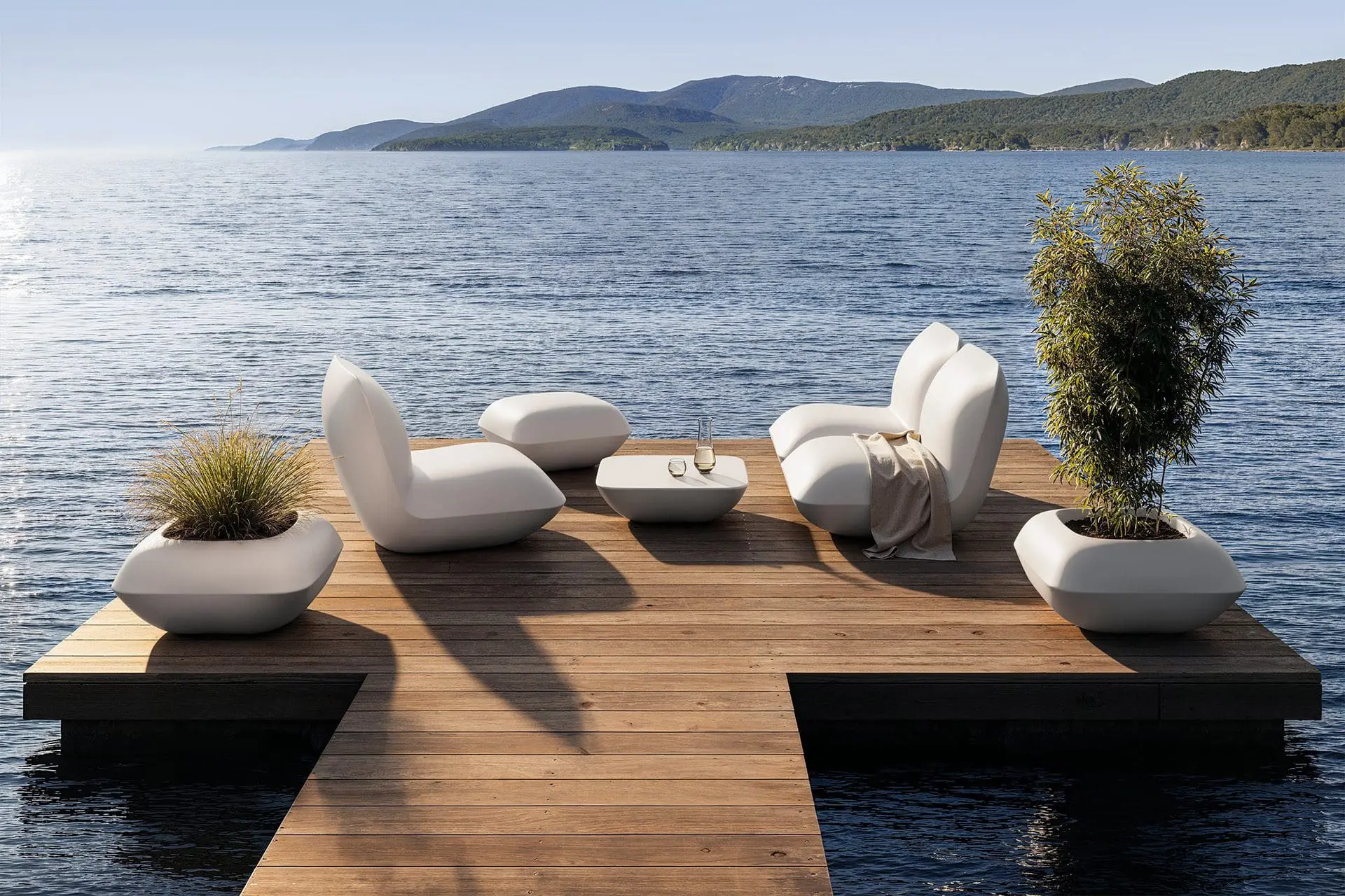 Vondom Pillow lounge chairs and planters, by Stefano Giovannoni