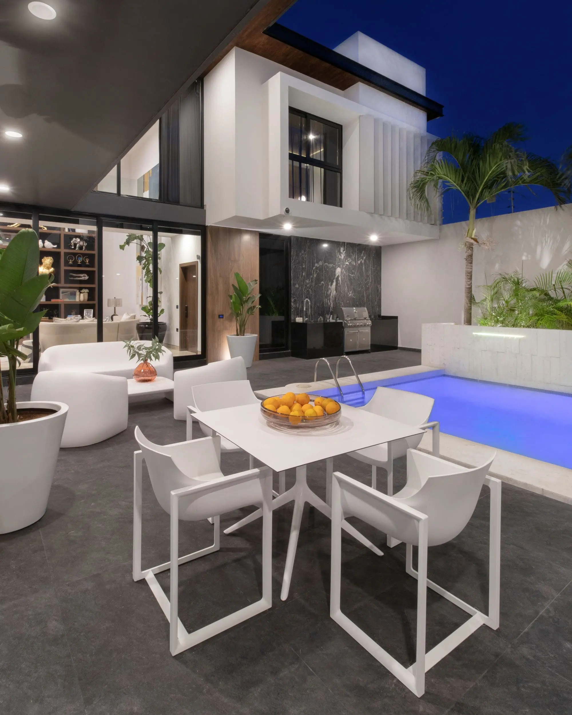 Outdoor furniture Wall Street armchairs and Mari-sol tables, luxury outdoor furniture by Vondom