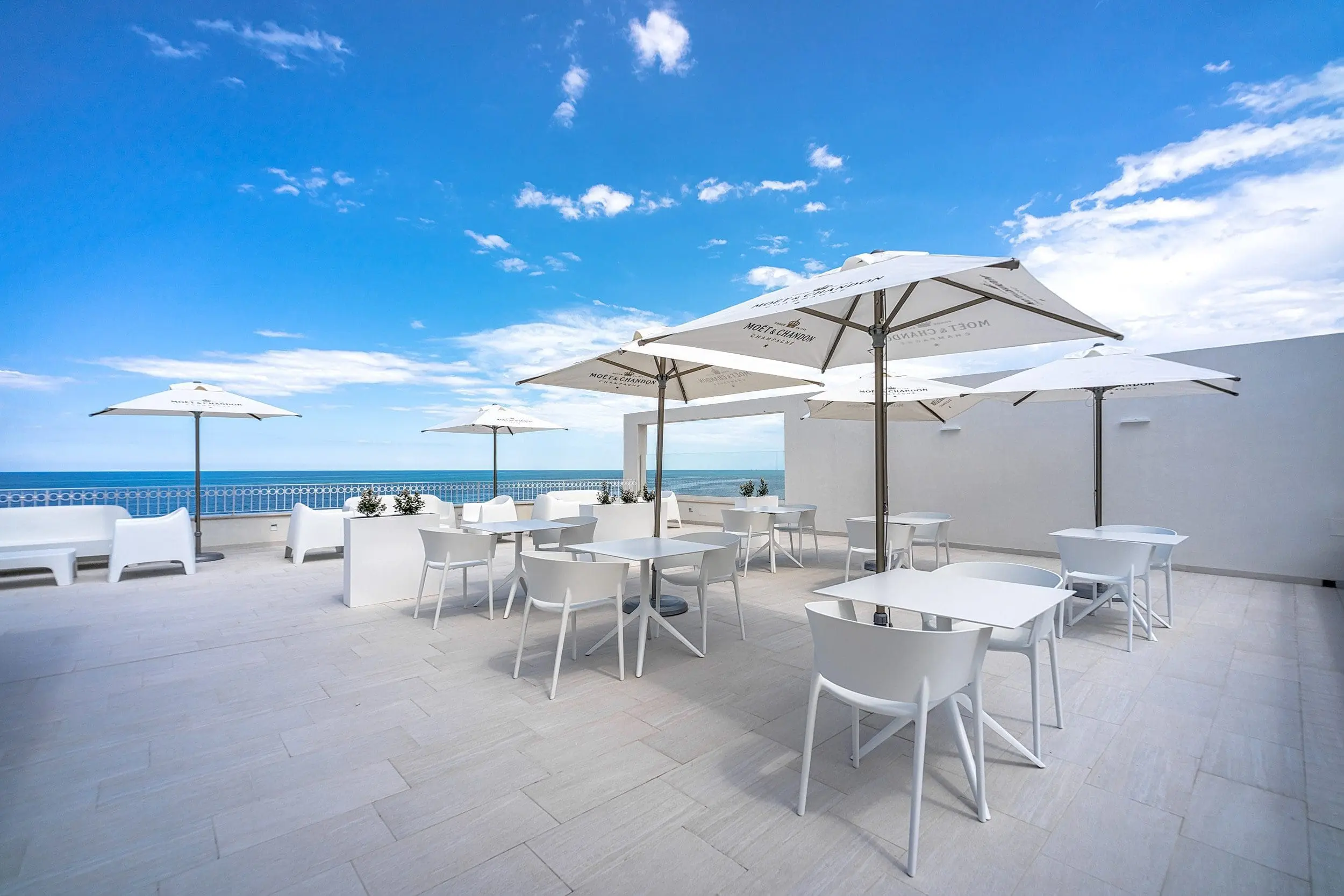 Outdoor elegant furniture Africa armchairs and Mari-Sol tables by Vondom