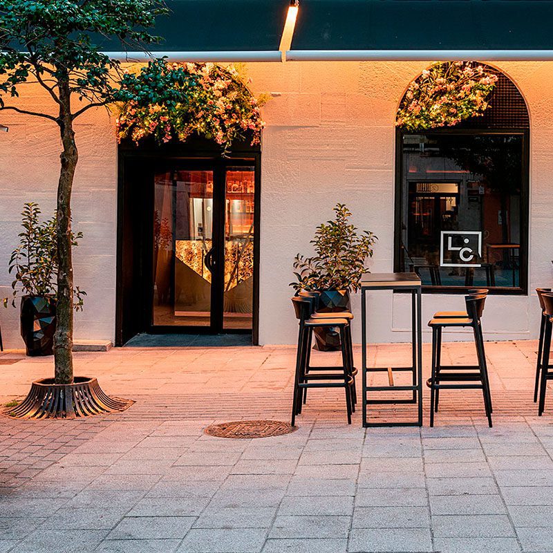 Outdoor furniture: stools, tables, chairs and planters, furniture for pub by Vondom