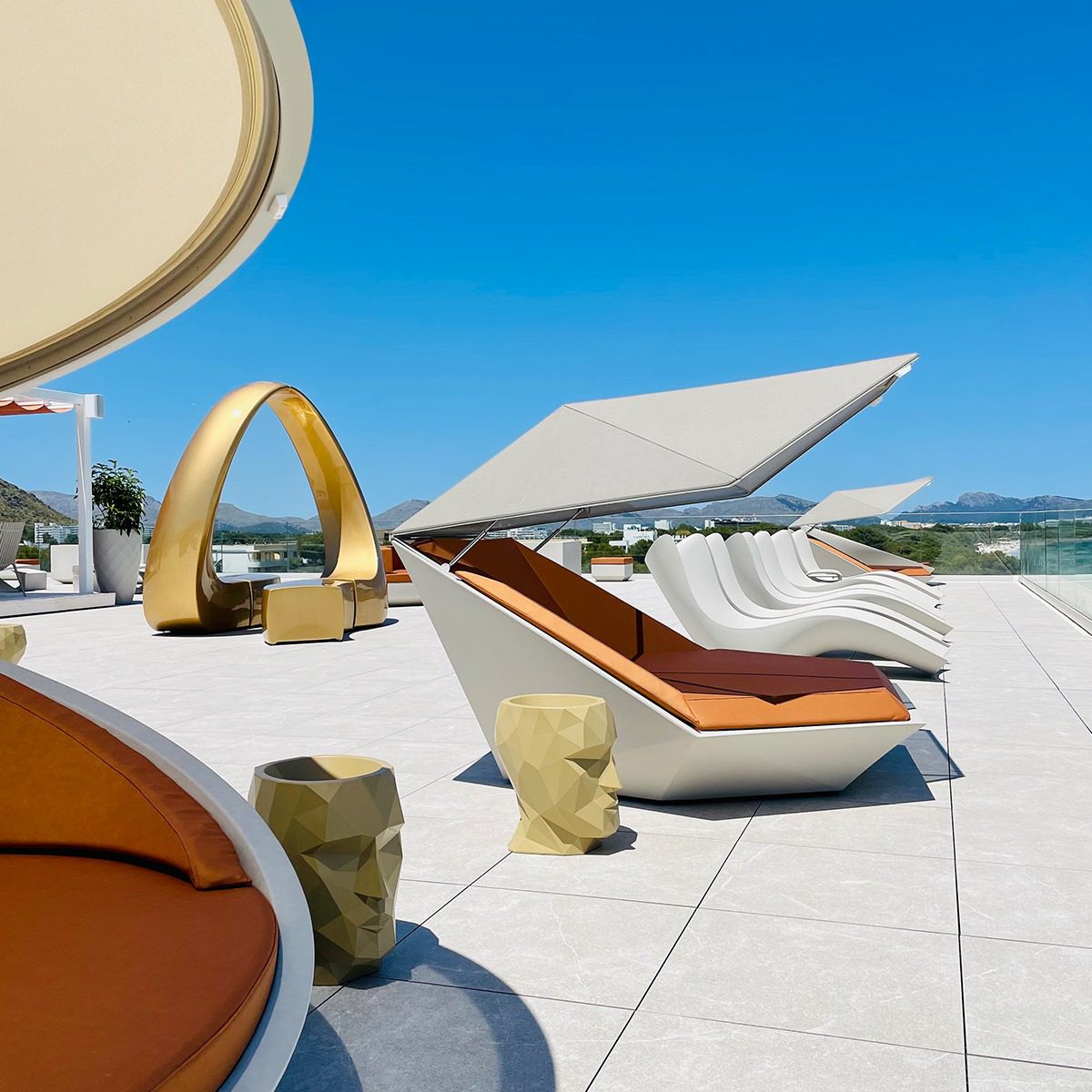 Outdoor contract furniture And bench, Adan planters and Faz daybeds, hospitality furniture by Vondom