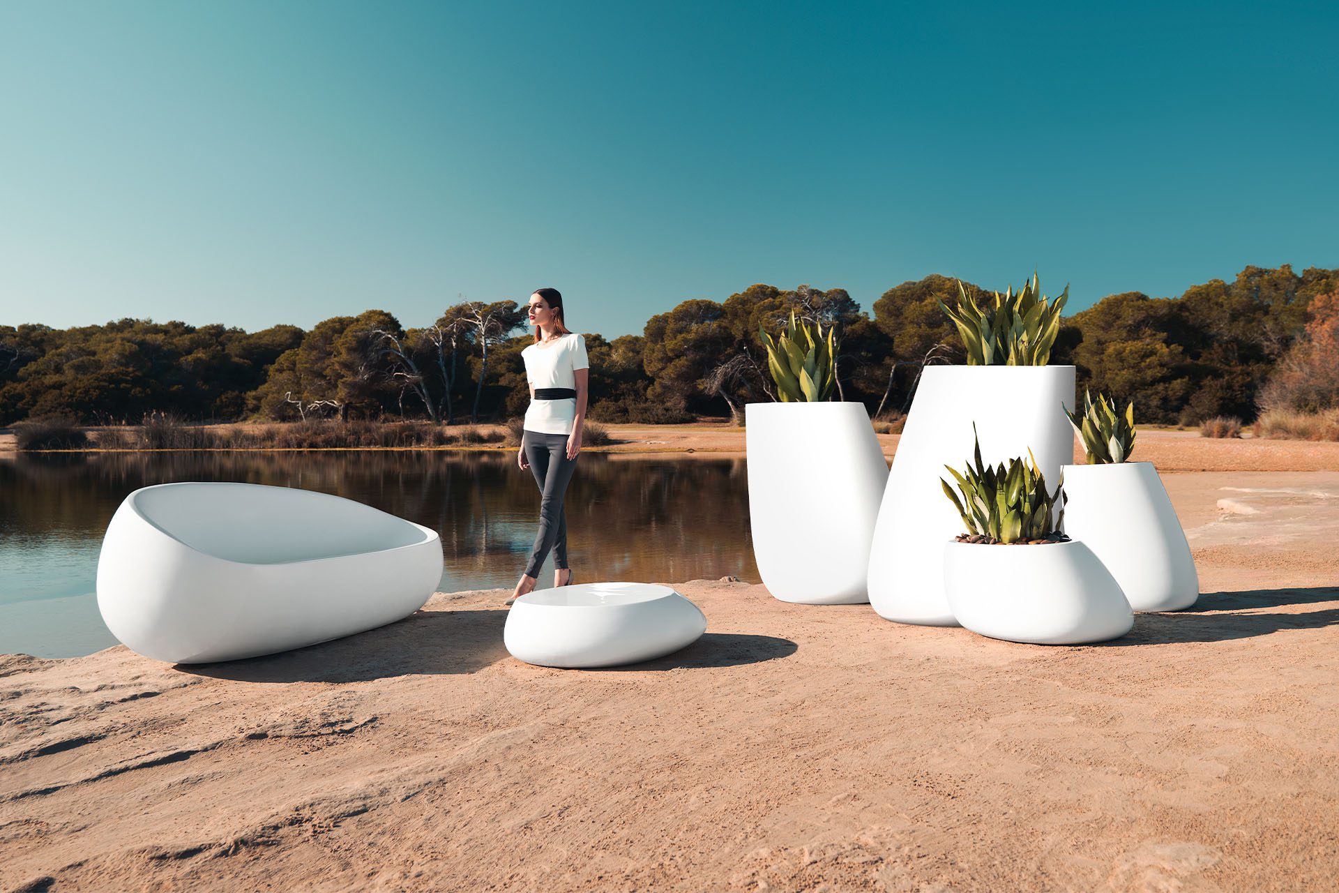 Stones outdoor sofa, armchair, table and planters by Stefano Giovannoni & Elisa Cargan Vondom